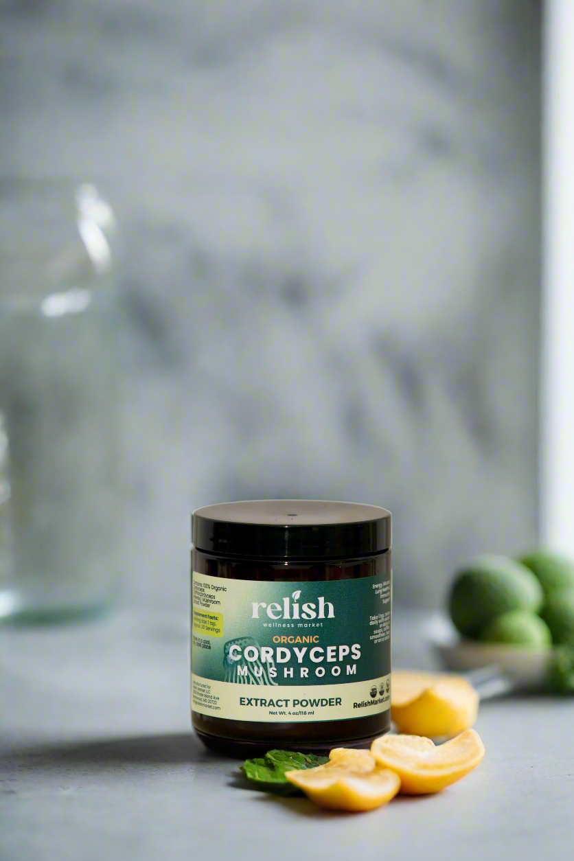Relish_market_Cordyceps Powder on counter with lemon lime accents