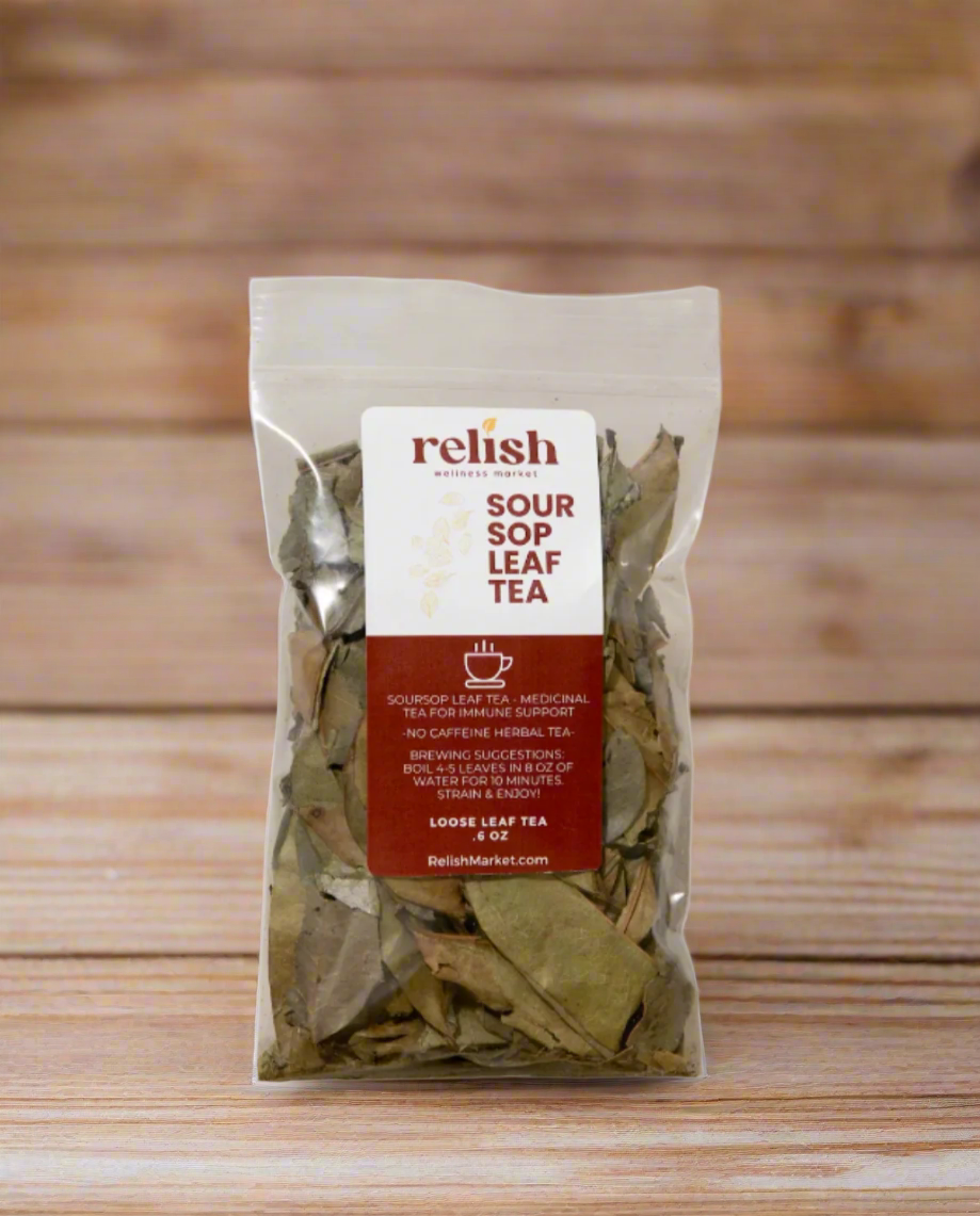 A clear stand-up pouch of Relish Market Soursop Leaf Tea on a wood background.