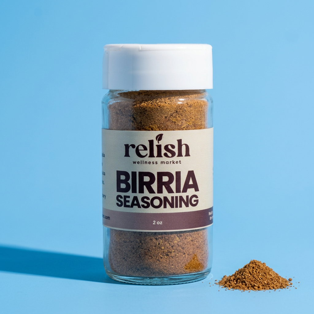 A 2 oz clear plastic bottle of Relish Wellness Market Birria Seasoning with a white cap, set against a solid light blue background with a small pile of the brown seasoning powder next to it.