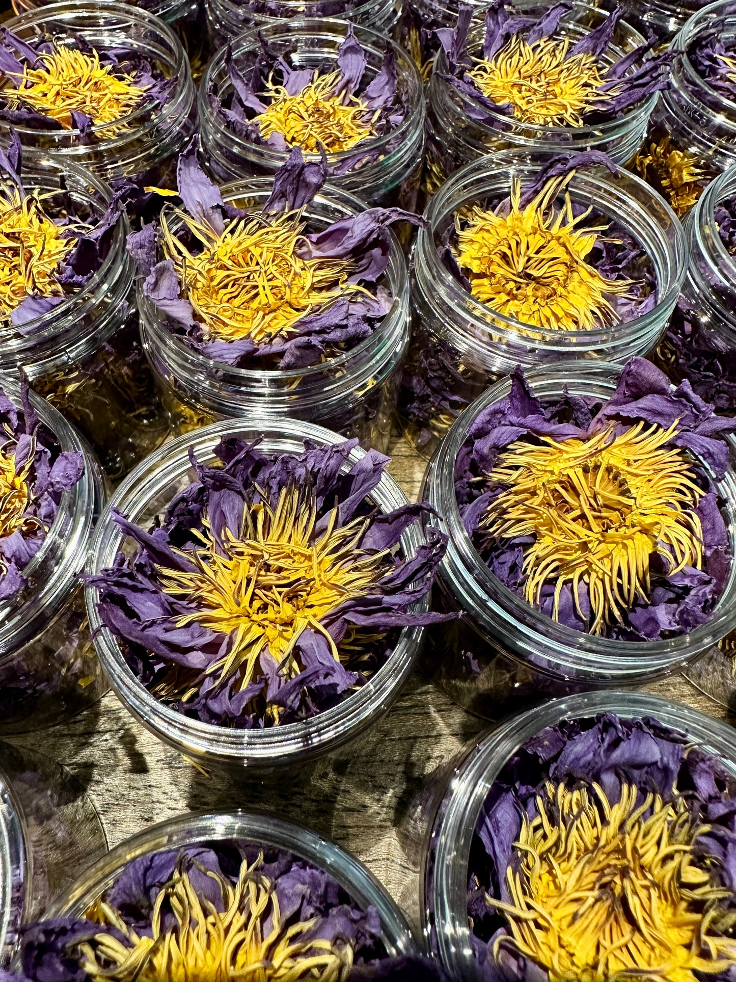 open jars of dried Blue Lotus Flowers by Relish Market.