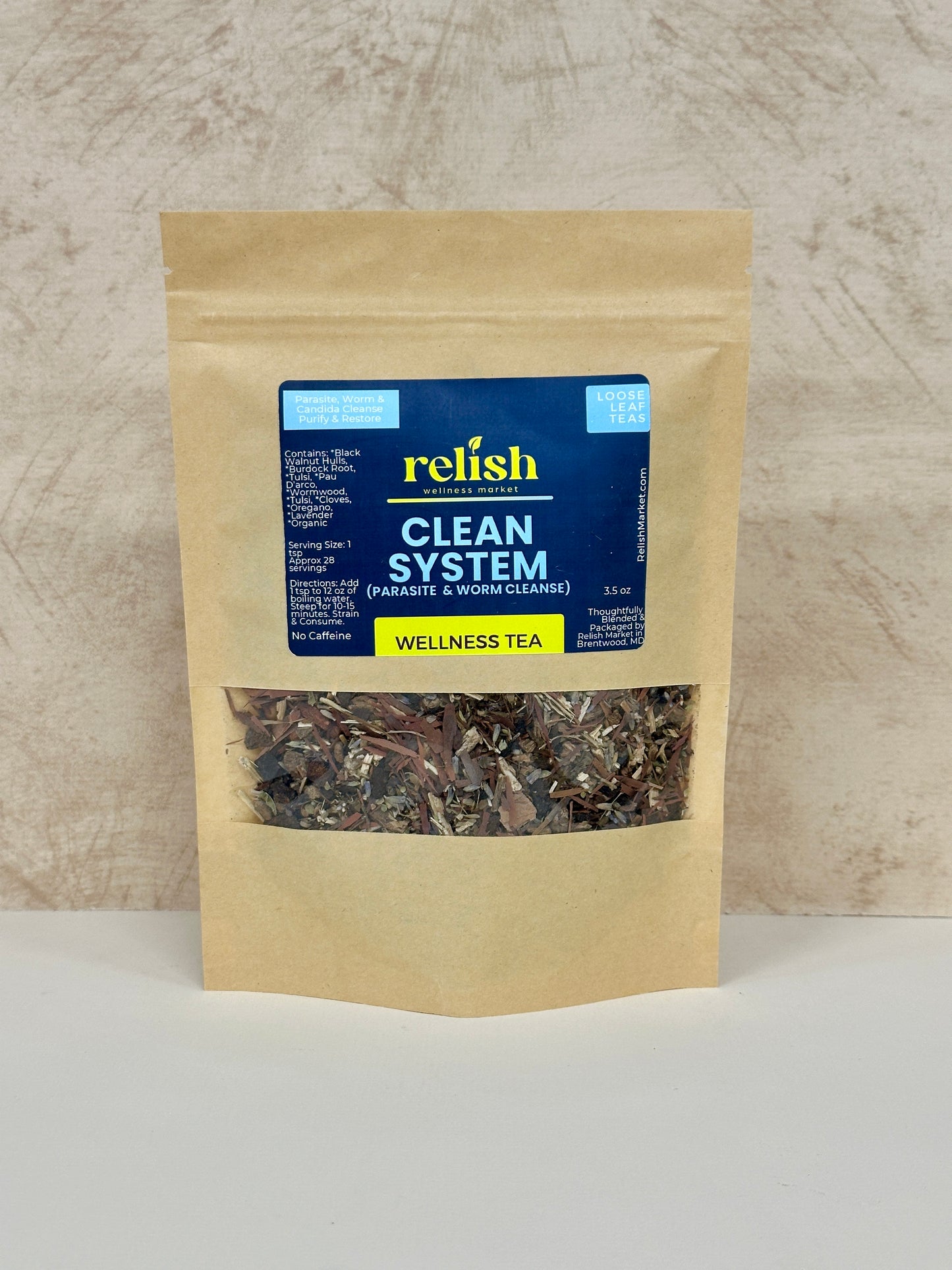 Bag of relish Clean System Wellness Tea on a neutral background