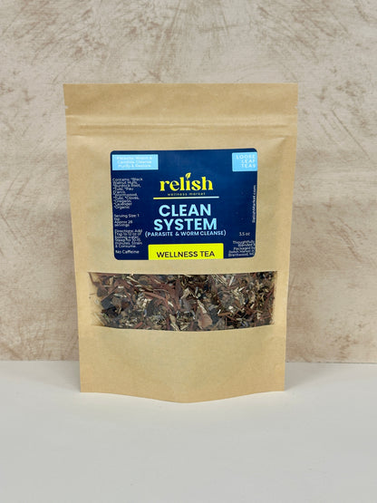 Bag of relish Clean System Wellness Tea on a neutral background