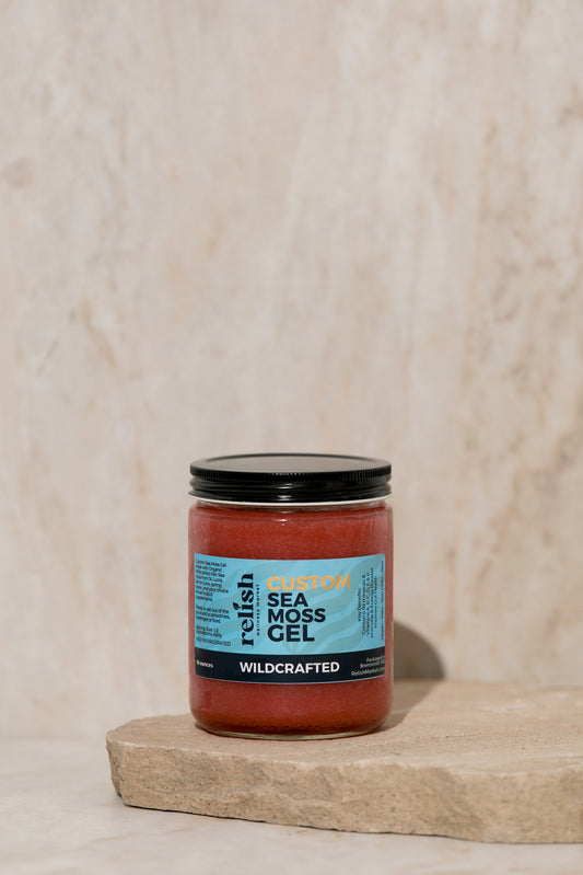Jar of Custom Fruit Flavored Sea Moss Gel by Relish Market on a stone slab and neutral background.