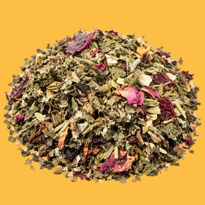 Mound of Hormonal Balance Tea Blend by Relish Market on a orange background. 