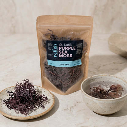Purple sea moss by Relish Market in a Kraft clear front zip bag, sitting next to a bowl of raw purple sea moss and a bowl of purple sea moss soaking close-up.