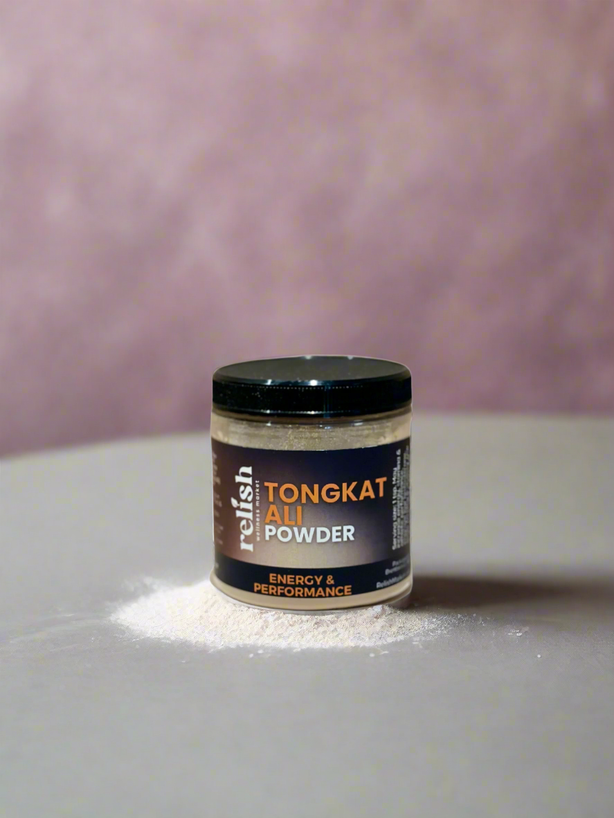 Jar of Tongkat Ali Powder by Relish Market sitting next to a splash of powder on a lavender patterned background.
