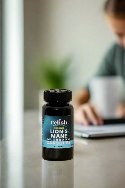 Relish Market Lions Mane Capsules with person in background laptop