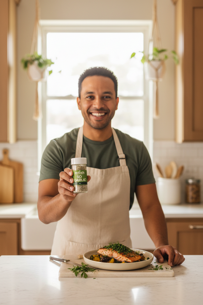 So Garlic Spice Blend with man holding the jar in a kitchen 