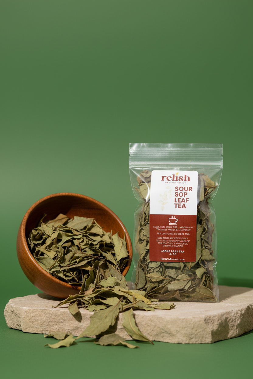 A clear stand-up pouch of Relish Market Soursop Leaf Tea stands on a stone slab next to a wooden bowl filled with dried green soursop leaves, against a solid green background.
