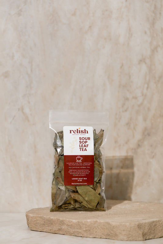 Packaged soursop leaf tea with Relish Market label on a stone surface